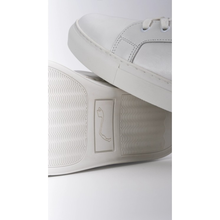 Detalle de la suela con diseño de circuito de las zapatillas de piel blanca Beco para hombre